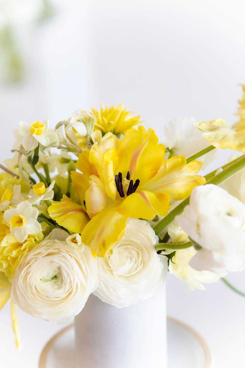 cream, white, and yellow flower arrangement