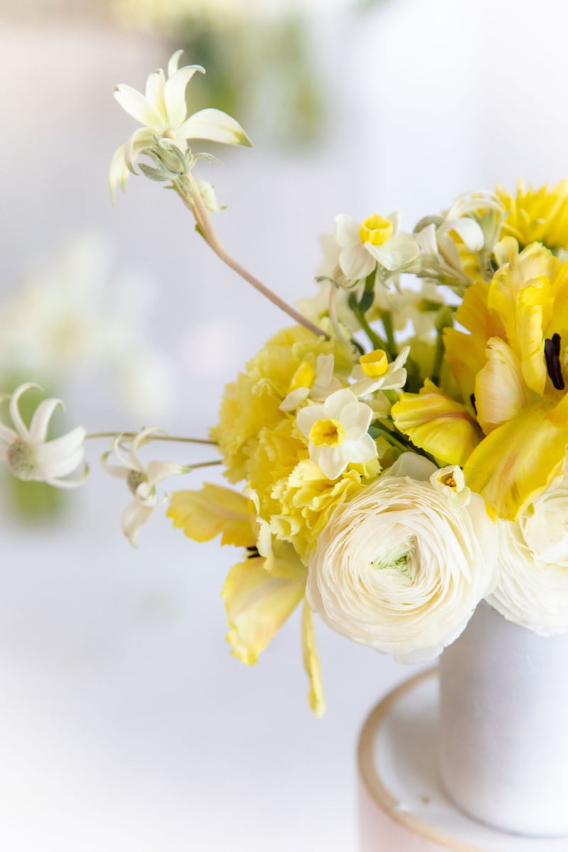 cream, white, and yellow flower arrangement