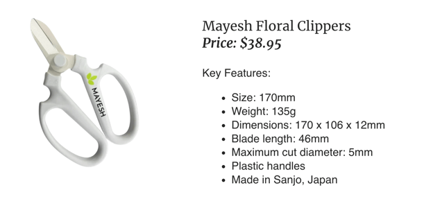 Mayesh Floral Clippers with white ergonomic handles and Mayesh branding, shown alongside key product details: price $38.95, size 170mm, weight 135g, dimensions 170 x 106 x 12mm, blade length 46mm, maximum cut diameter 5mm, plastic handles, and made in Sanjo, Japan.